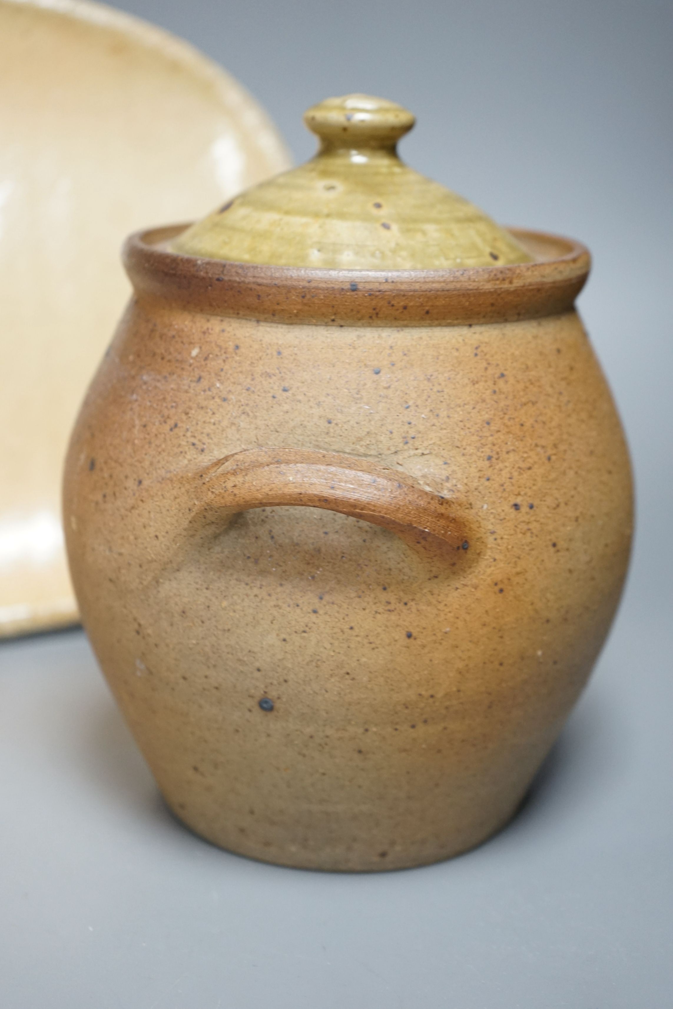 British studio pottery; a group to include a Micki Schloessingk (b.1949) salt glaze teapot and cover, together with other similar items and other studio pottery wares, largest 39cm wide, (5)